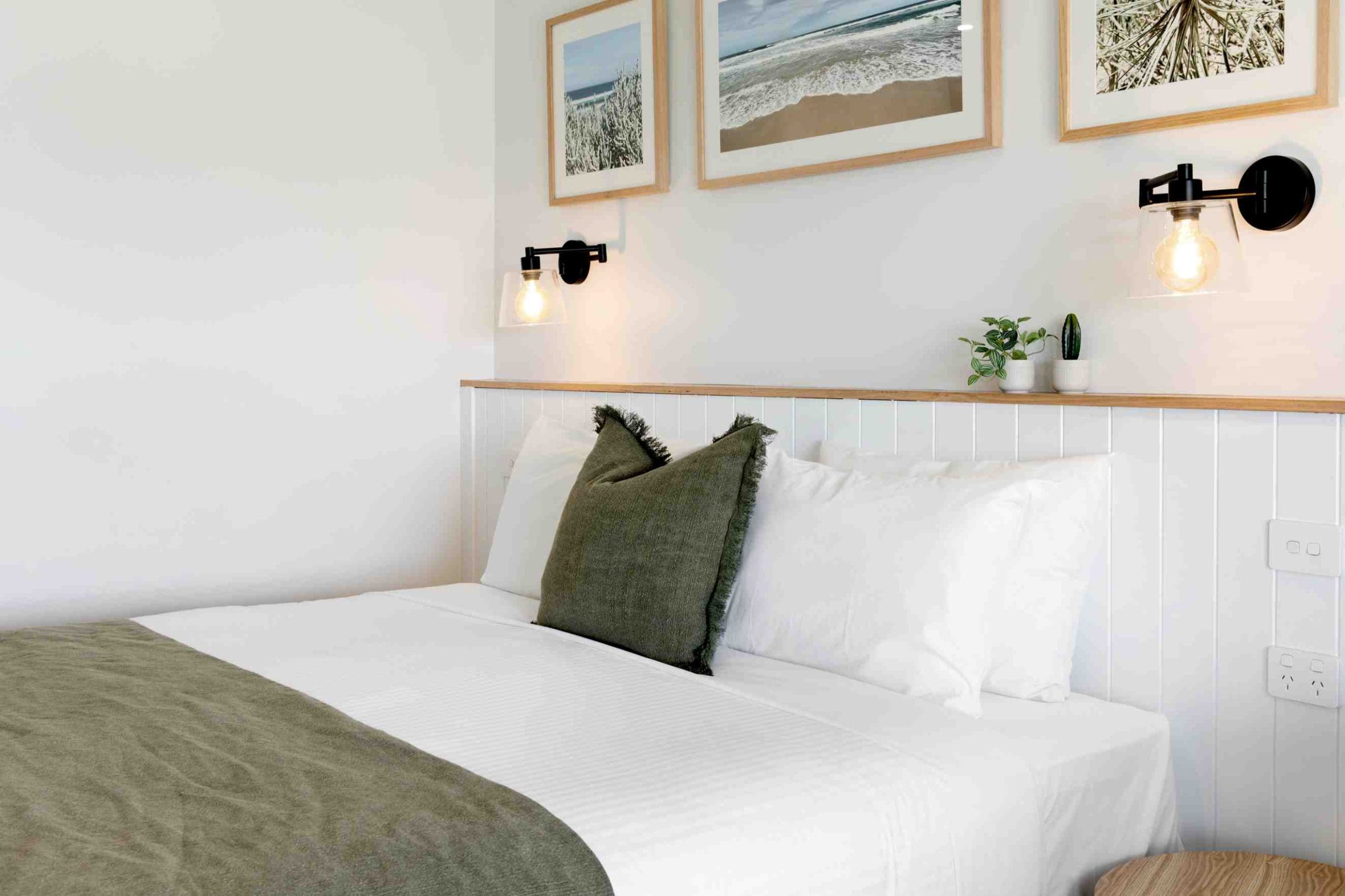 A renovated queen bed room at Mariners Cove in Paynesville